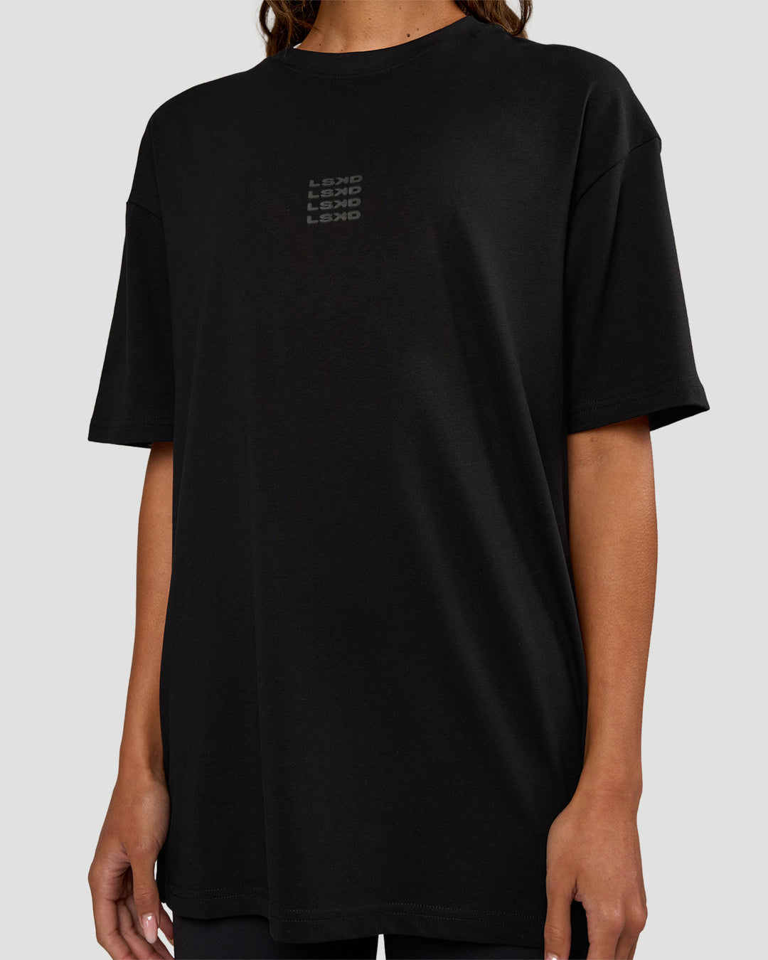 Woman wearing Everyday Elevation FLXCotton Oversized Tee - Black-Black | Model:Dakota | Size:XS - view 9