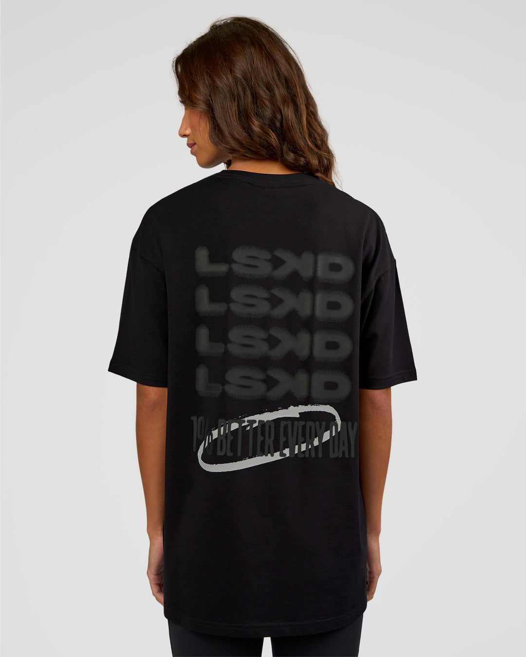 Woman wearing Everyday Elevation FLXCotton Oversized Tee - Black-Black | Model:Dakota | Size:XS - view 4