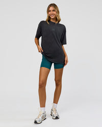 Woman wearing Everyday Elevation FLXCotton Oversized Tee - Black Washed-Carbon Green | Model:Leilani | Size:XS | Thumbnail Index: 8