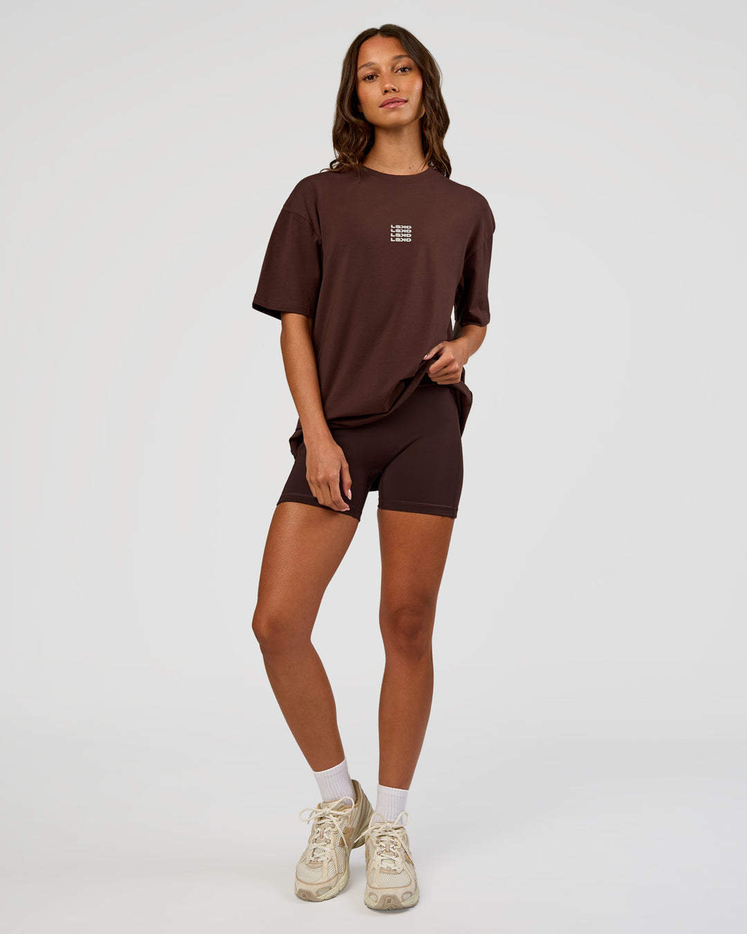 Woman wearing Everyday Elevation FLXCotton Oversized Tee - Hot Chocolate-Off White | Model:Dakota | Size:XS - view 7