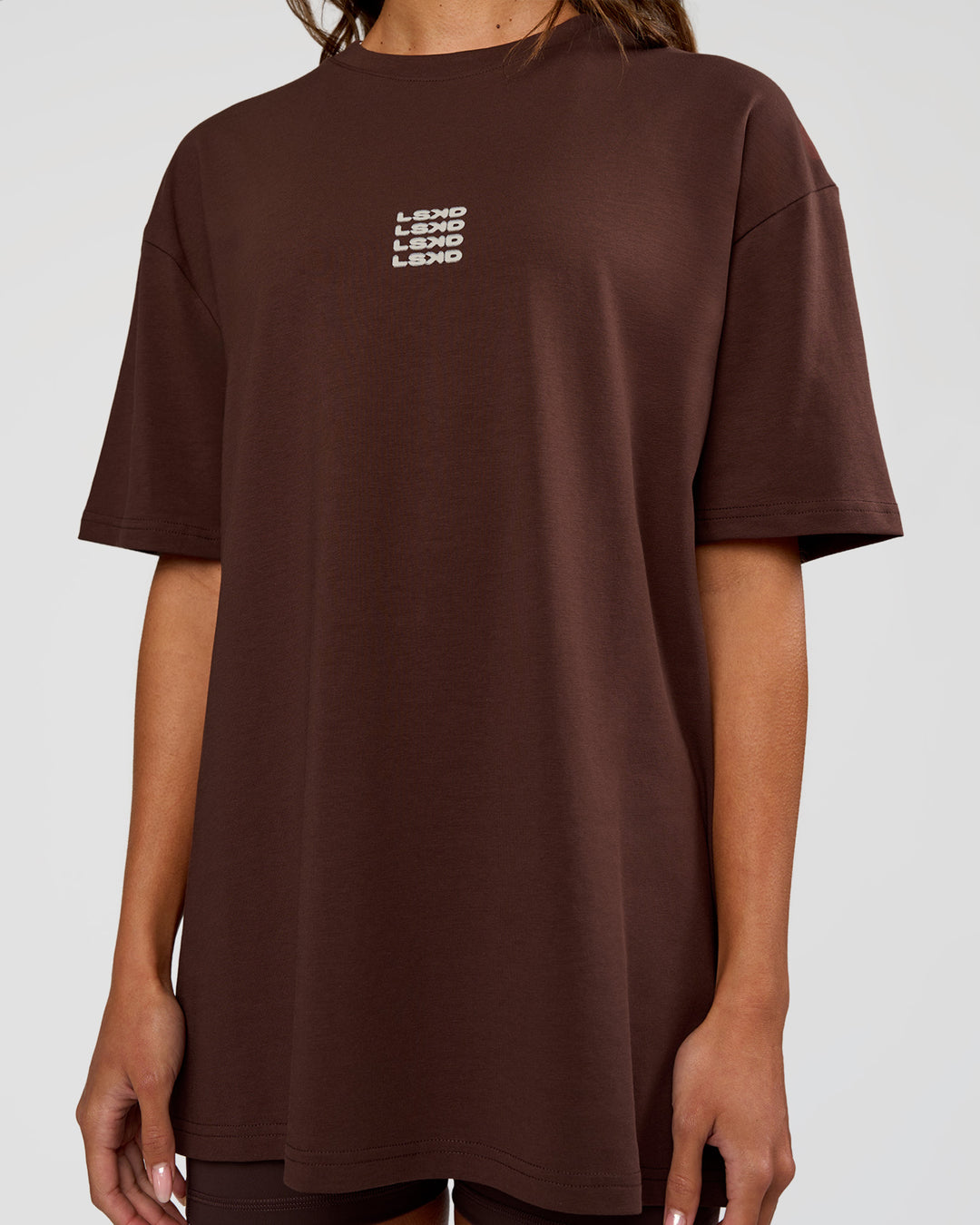 Woman wearing Everyday Elevation FLXCotton Oversized Tee - Hot Chocolate-Off White | Model:Dakota | Size:XS - view 11