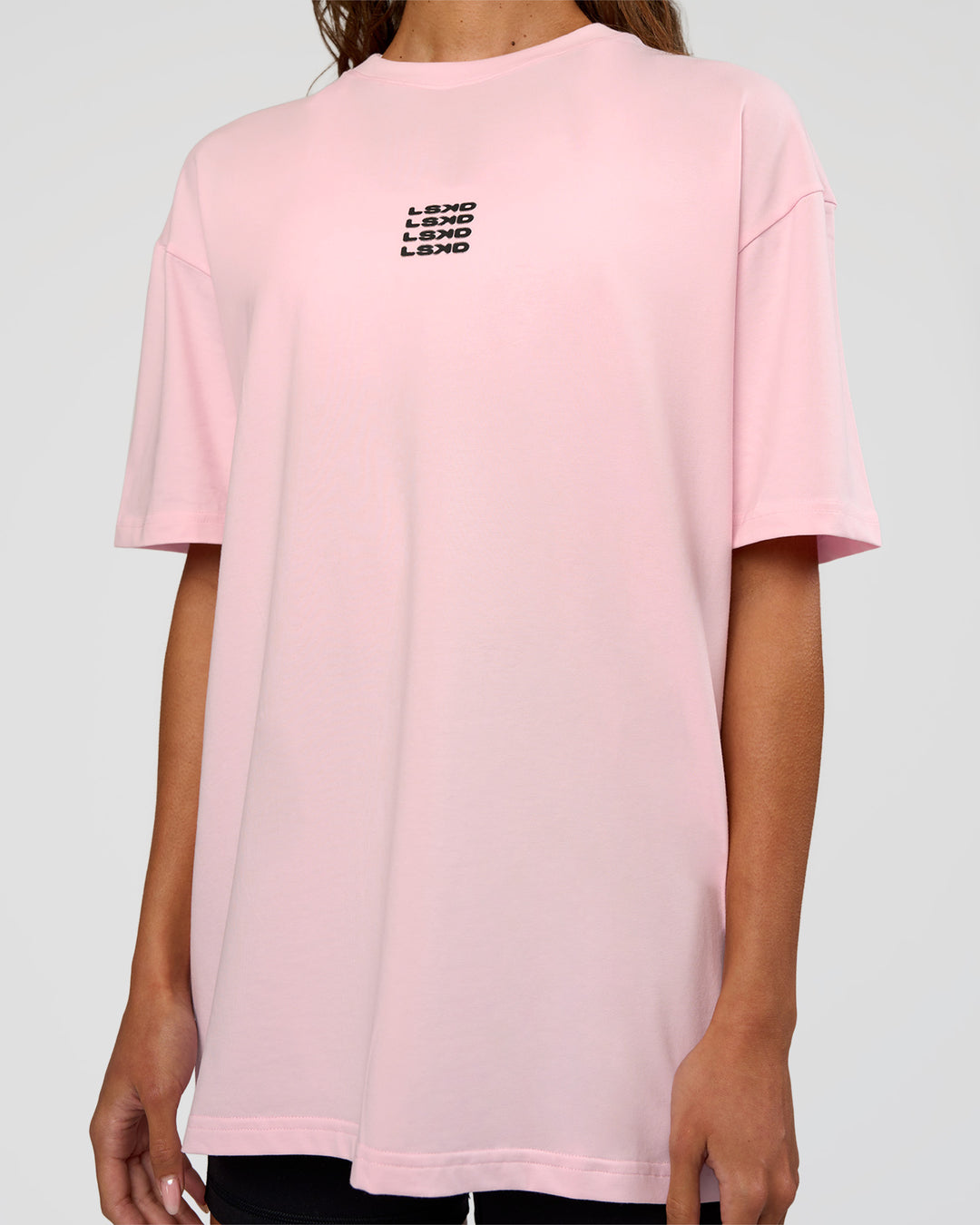 Woman wearing Everyday Elevation FLXCotton Oversized Tee - Marshmallow-Black | Model:Dakota | Size:XS - view 11
