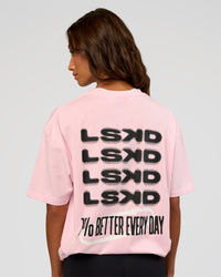 Woman wearing Everyday Elevation FLXCotton Oversized Tee - Marshmallow-Black | Model:Dakota | Size:XS | Thumbnail Index: 4