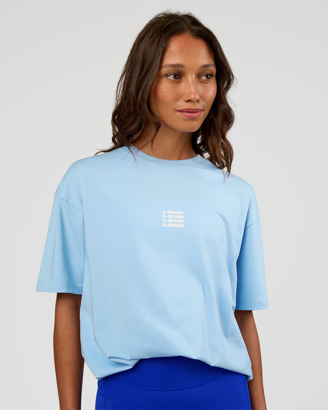 Woman wearing Everyday Elevation FLXCotton Oversized Tee - Open Air-Off White | Model:Dakota | Size:XS - view 5