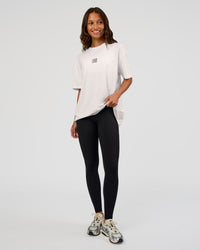 Woman wearing Everyday Elevation FLXCotton Oversized Tee - White-Carbon Green | Model:Dakota | Size:XS | Thumbnail Index: 8