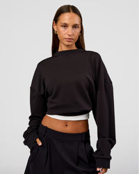 Woman wearing Everyday Elevation Waffle Oversized Sweater - Black | Model:Brylee | Size:XS | Thumbnail Index: 8