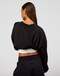 Woman wearing Everyday Elevation Waffle Oversized Sweater - Black | Model:Brylee | Size:XS | Thumbnail Index: 10