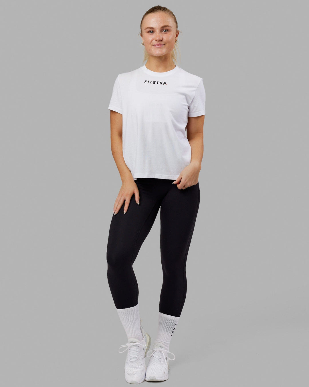 Woman wearing Fitstop Fast Tee - White - view 2