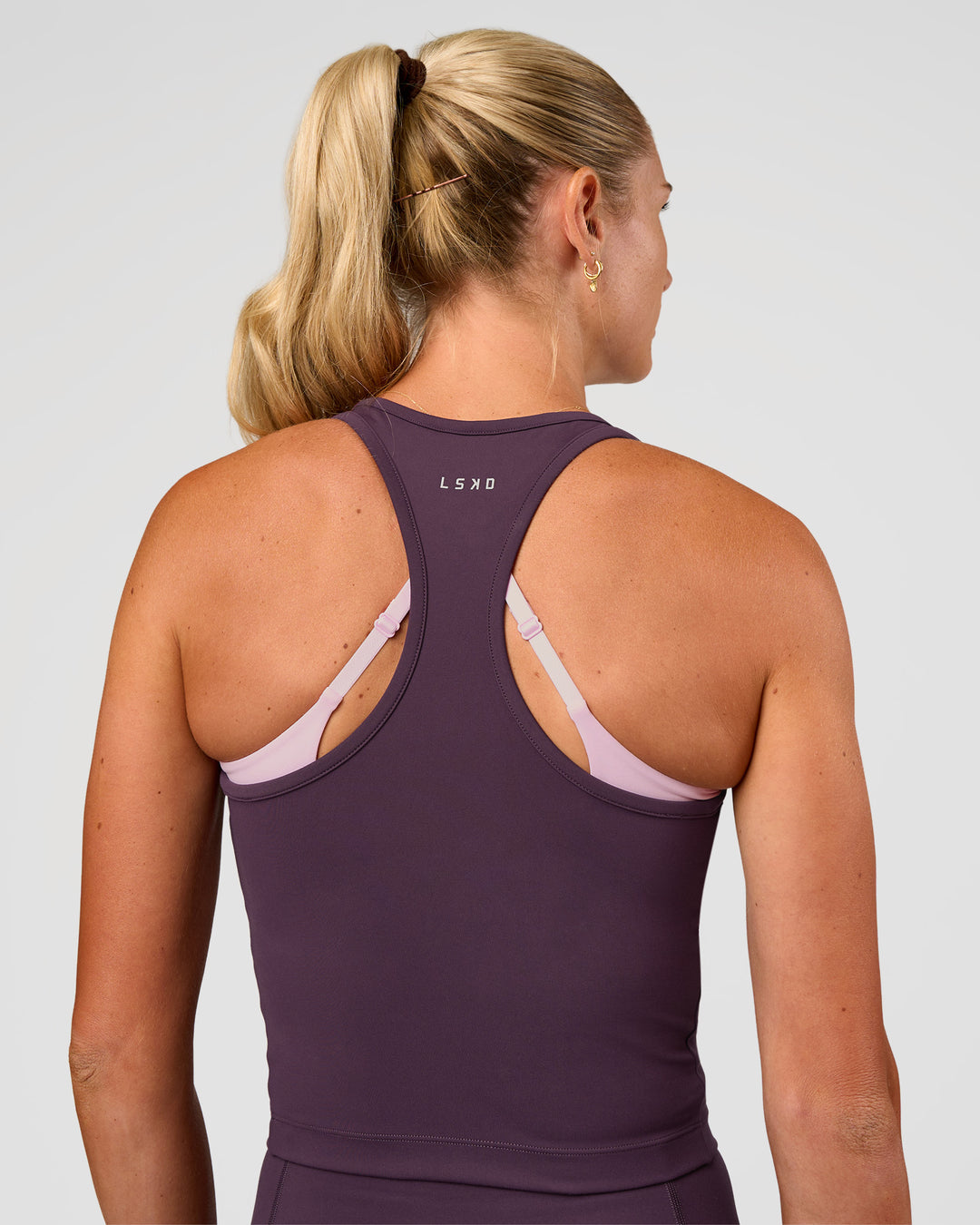 Woman wearing Flow Performance Tank 2.0 - Midnight Plum | Model:Emelia | Size:XS - view 3