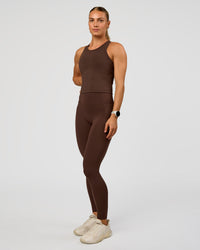 Woman wearing Flow Performance Tank 2.0 - Hot Chocolate | Model:Maja | Size:XS | Thumbnail Index: 1