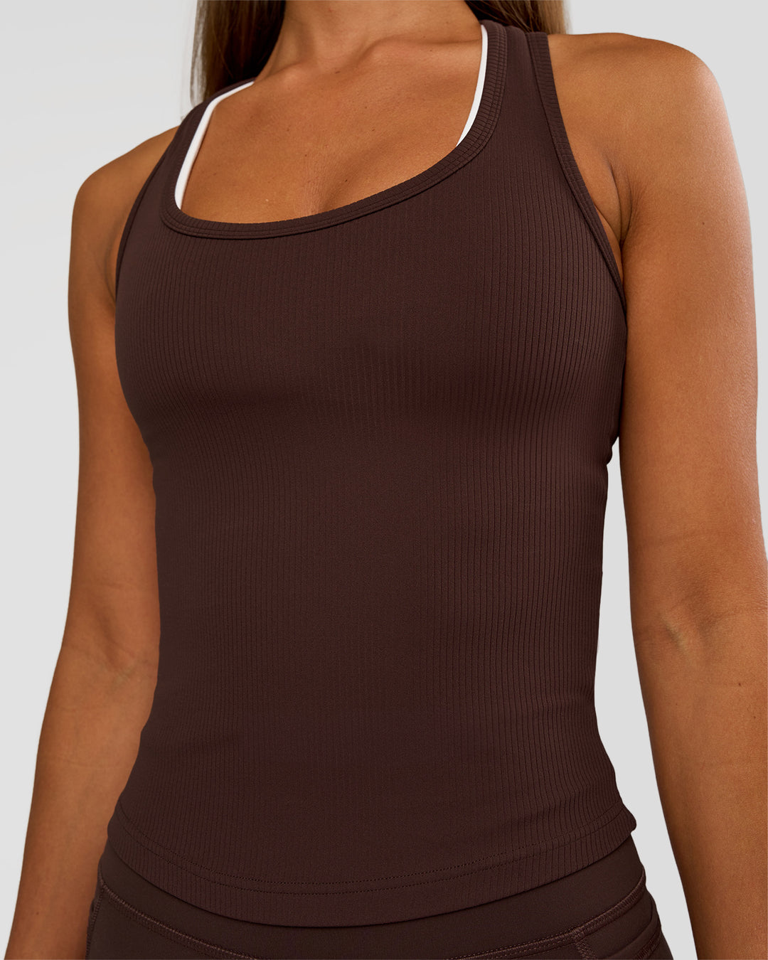Woman wearing Flow Rib Scoop Neck Tank - Hot Chocolate | Model:Brylee | Size:XS - view 5