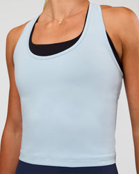 Woman wearing Flow Scoop Neck Performance Tank - Blue Aura | Model:Emelia | Size:XS | Thumbnail Index: 3