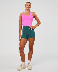 Woman wearing Flow Scoop Neck Performance Tank - Ultra Fuchsia | Model:Emelia | Size:XS | Thumbnail Index: 4