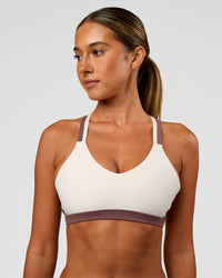 Woman wearing Force Sports Bra - Cocoa Powder-Off White | Model:Charli | Size:XS | Thumbnail Index: 2