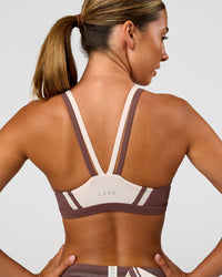 Woman wearing Force Sports Bra - Cocoa Powder-Off White | Model:Charli | Size:XS | Thumbnail Index: 1