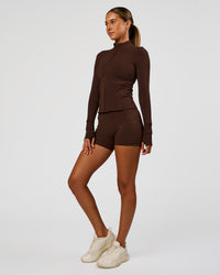 Woman wearing Fusion Active Jacket - Hot Chocolate | Model:Charli | Size:XS | Thumbnail Index: 6