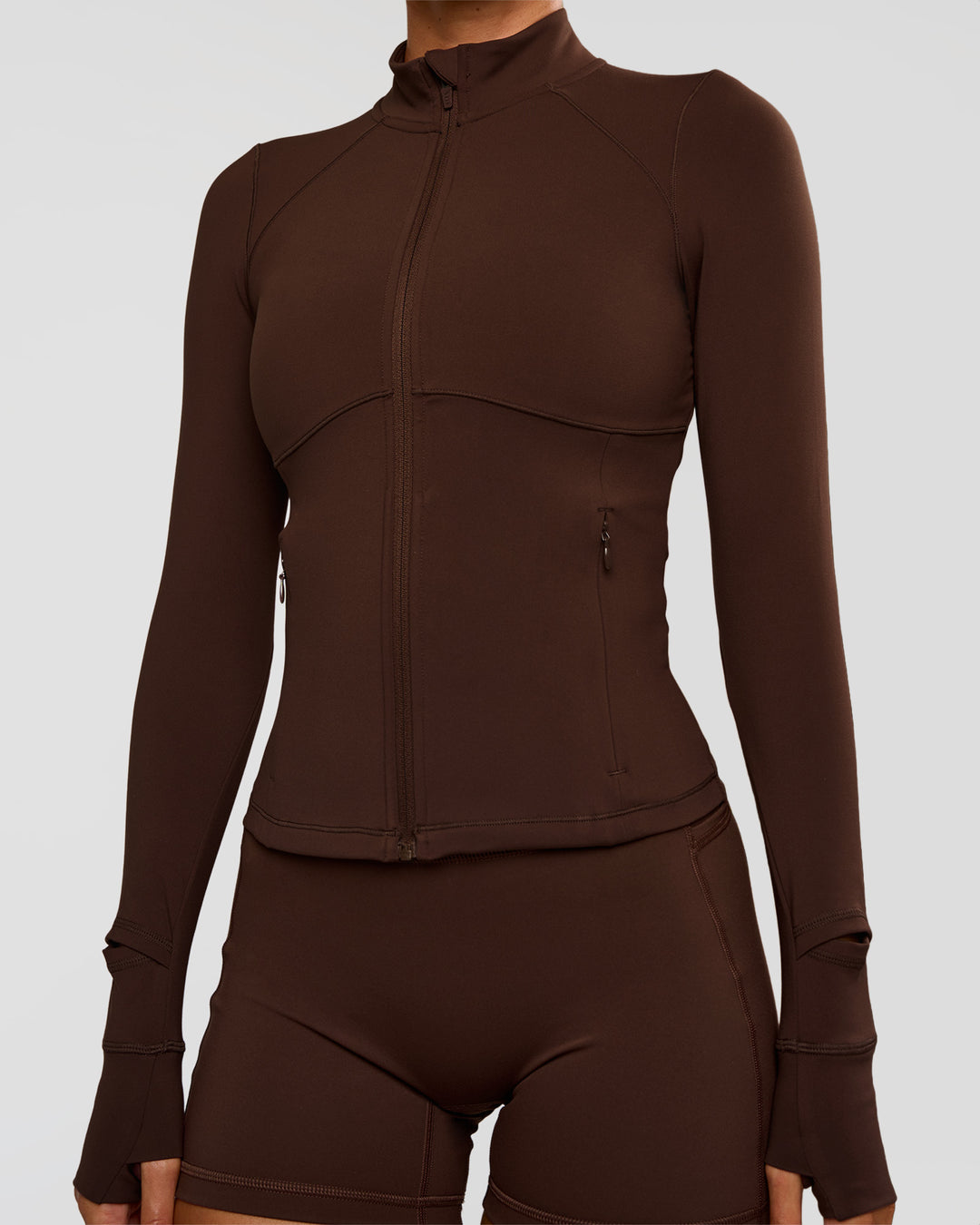 Woman wearing Fusion Active Jacket - Hot Chocolate | Model:Charli | Size:XS - view 10