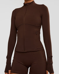 Woman wearing Fusion Active Jacket - Hot Chocolate | Model:Charli | Size:XS | Thumbnail Index: 9