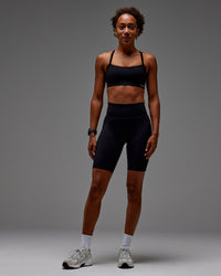 Woman wearing Fusion Ultra High-Rise 9" Short Pockets - Black | Model:Txai | Size:XS | Thumbnail Index: 15