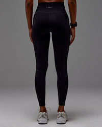 Woman wearing Fusion Ultra High-Rise Full Length Legging Pockets - Black | Model: Txai | Size:XS | Thumbnail Index: 19