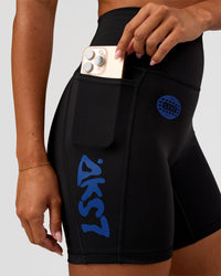 Woman wearing Fusion Hype Graphic Ultra High-Rise 6" Short Pockets - Black-Electric Indigo | Model:Charli | Size:XS | Thumbnail Index: 2