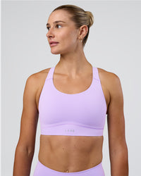 Woman wearing Fusion Sports Bra 2.0 - Pale Lilac | Model:Emelia | Size:XS | Thumbnail Index: 0