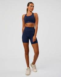 Woman wearing Fusion Sports Bra 2.0 - Future Navy | Model:Charlie | Size:S | Thumbnail Index: 5