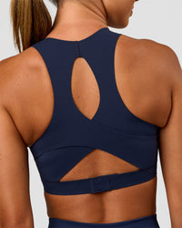 Woman wearing Fusion Sports Bra 2.0 - Future Navy | Model:Charlie | Size:S | Thumbnail Index: 4