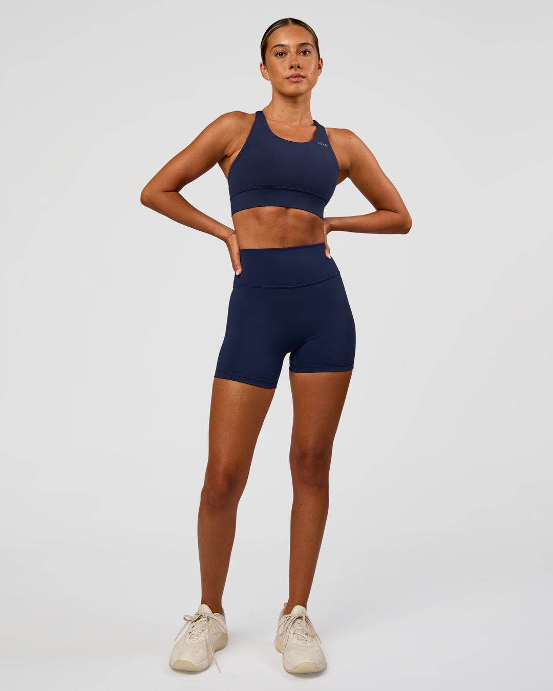 Woman wearing Fusion Ultra High-Rise 4" Short - Future Navy | Model:Charli | Size:XS - view 5