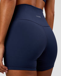 Woman wearing Fusion Ultra High-Rise 4" Short - Future Navy | Model:Charli | Size:XS | Thumbnail Index: 6