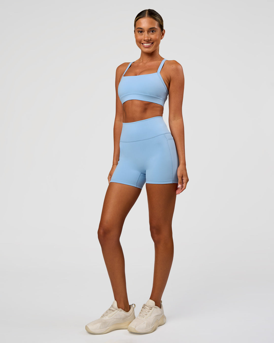 Woman wearing Fusion Ultra High-Rise 4" Short Pockets - Open Air | Model:Charli | Size:XS - view 6