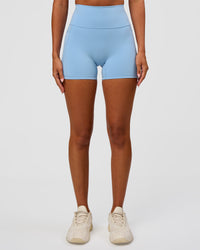Woman wearing Fusion Ultra High-Rise 4" Short Pockets - Open Air | Set:true | Angle:front | Model:Charli | Size:XS | Thumbnail Index: 6