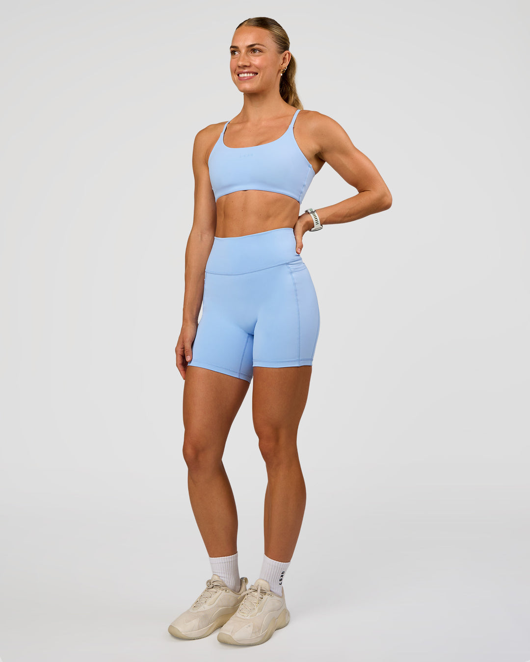 Woman wearing Fusion Ultra High-Rise 6" Short Pockets - Open Air | Model:Maja | Size:XS - view 2