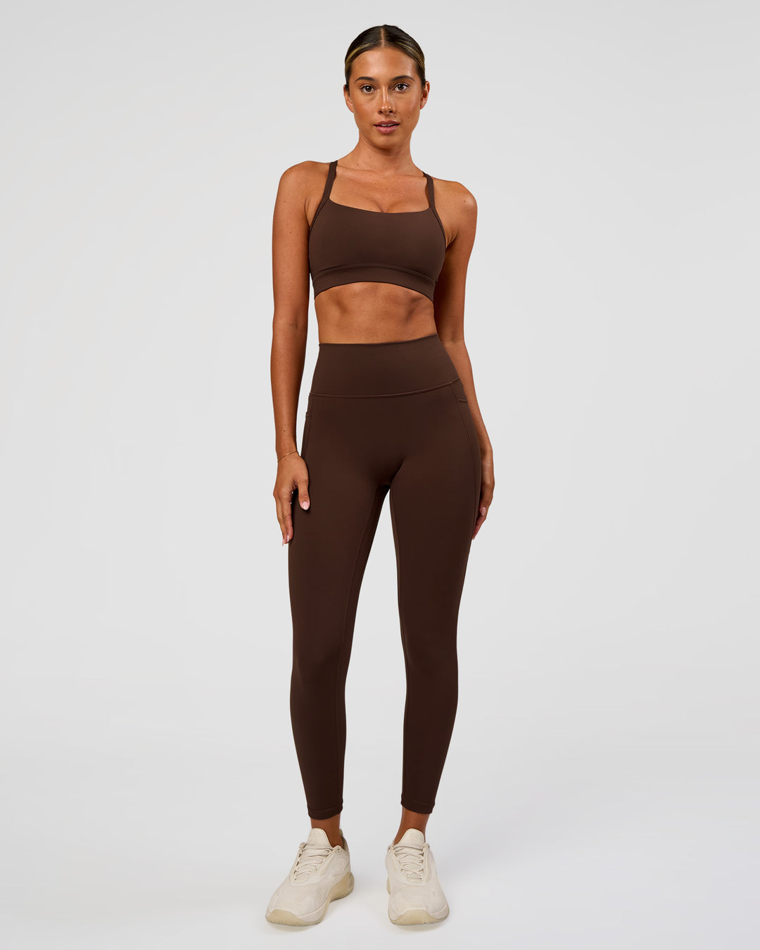 Woman wearing Fusion Ultra High-Rise 7/8 Legging Pockets - Hot Chocolate | Model:Charli | Size:XS - view 2