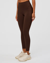 Woman wearing Fusion Ultra High-Rise 7/8 Legging Pockets - Hot Chocolate | Model:Charli | Size:XS | Thumbnail Index: 6