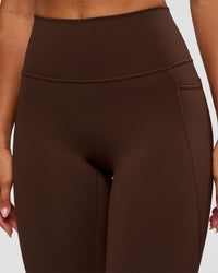 Woman wearing Fusion Ultra High-Rise 7/8 Legging Pockets - Hot Chocolate | Model:Charli | Size:XS | Thumbnail Index: 8