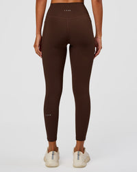 Woman wearing Fusion Ultra High-Rise 7/8 Legging Pockets - Hot Chocolate | Model:Charli | Size:XS | Thumbnail Index: 2