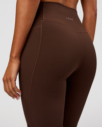 Woman wearing Fusion Ultra High-Rise 9" Short Pockets - Hot Chocolate | Model:Charli | Size:XS | Thumbnail Index: 7