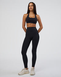 Woman wearing Fusion Ultra High-Rise Full Length Legging - Black | Model:Eliza | Size:XS | Thumbnail Index: 6