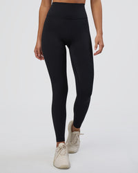 Woman wearing Fusion Ultra High-Rise Full Length Legging - Black | Model:Eliza | Size:XS | Thumbnail Index: 0