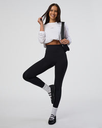 Woman wearing Fusion Ultra High-Rise Full Length Legging - Black | Model:Eliza | Size:XS | Thumbnail Index: 1