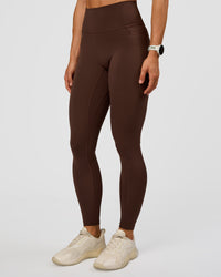 Woman wearing Fusion Ultra High-Rise Full Length Legging Pockets - Hot Chocolate | Model:Maja | Size:XS | Thumbnail Index: 7