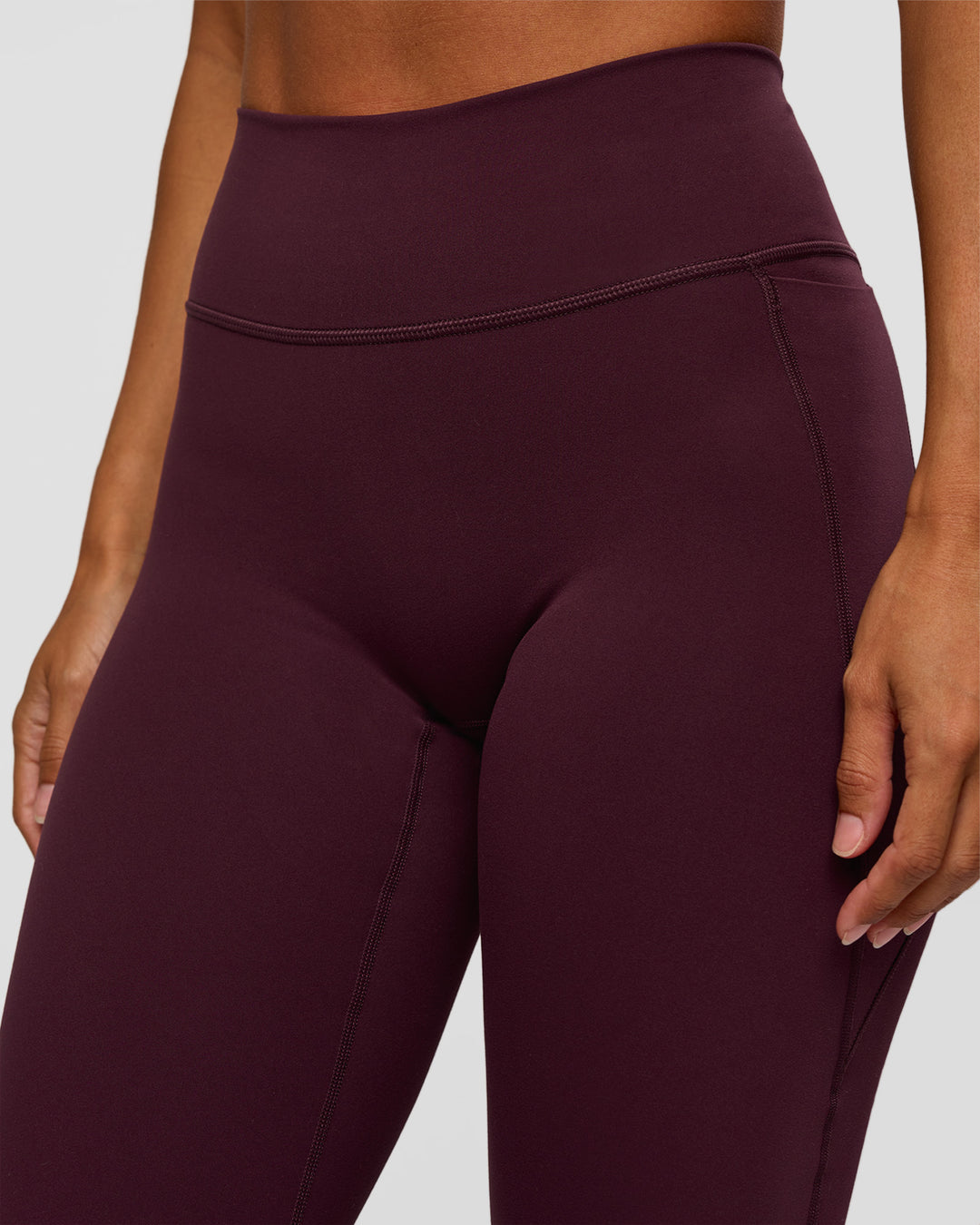 Woman wearing Fusion V-Contour High-Rise Flared Petite Legging Pockets - Cherry Lacquer | Model:Brylee | Size:XS - view 9
