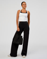 Woman wearing Fusion V-Contour High-Rise Pant - Black | Model:Charli | Size:XS | Thumbnail Index: 2