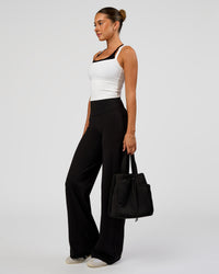 Woman wearing Fusion V-Contour High-Rise Pant - Black | Model:Charli | Size:XS | Thumbnail Index: 8