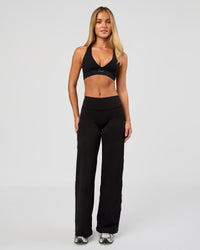 Woman wearing Fusion V-Contour High-Rise Petite Pant - Black | Model:Issy | Size:XS | Thumbnail Index: 3