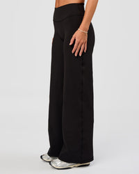 Woman wearing Fusion V-Contour High-Rise Petite Pant - Black | Model:Issy | Size:XS | Thumbnail Index: 6