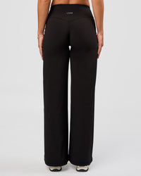 Woman wearing Fusion V-Contour High-Rise Petite Pant - Black | Model:Issy | Size:XS | Thumbnail Index: 7