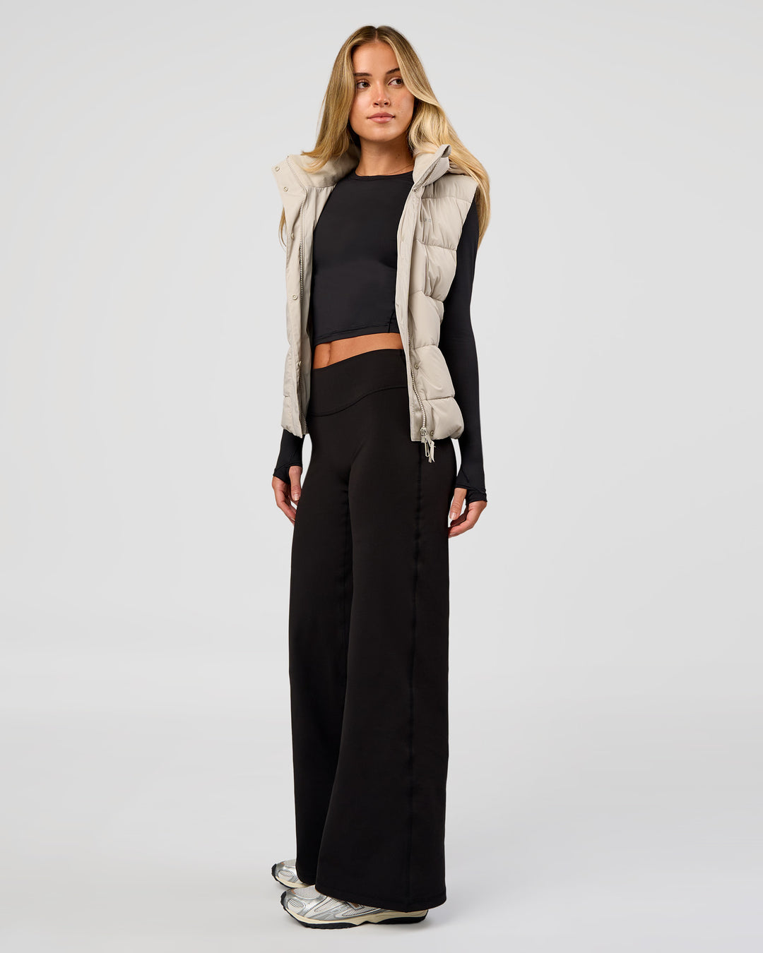 Woman wearing Fusion V-Contour High-Rise Petite Pant - Black | Model:Issy | Size:XS - view 9