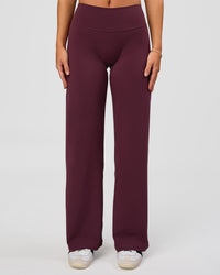 Woman wearing Fusion V-Contour High-Rise Petite Pant - Cherry Lacquer | Model:Issy | Size:XS | Thumbnail Index: 0